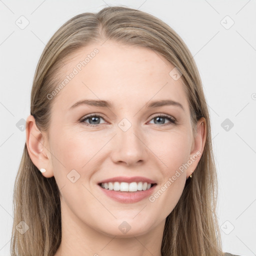 Joyful white young-adult female with long  brown hair and grey eyes