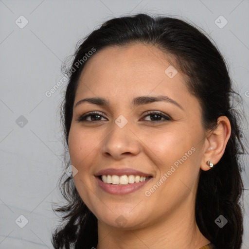 Joyful white young-adult female with long  brown hair and brown eyes