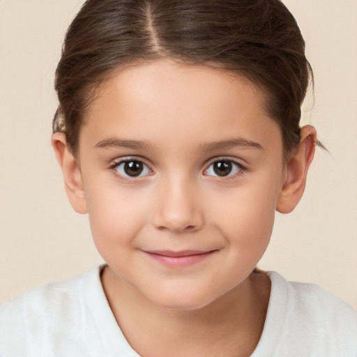 Joyful white child female with short  brown hair and brown eyes