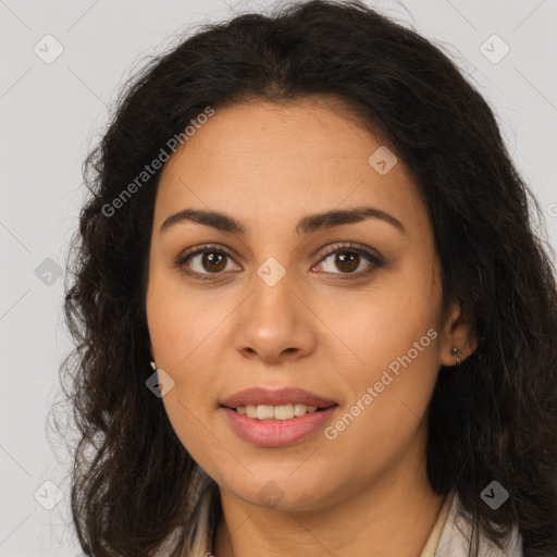 Joyful latino young-adult female with long  brown hair and brown eyes