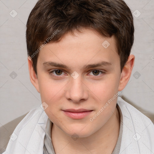 Joyful white child male with short  brown hair and brown eyes