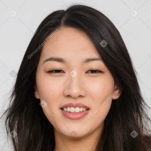 Joyful asian young-adult female with long  brown hair and brown eyes