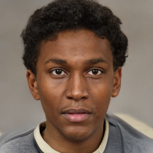 Neutral latino young-adult male with short  brown hair and brown eyes