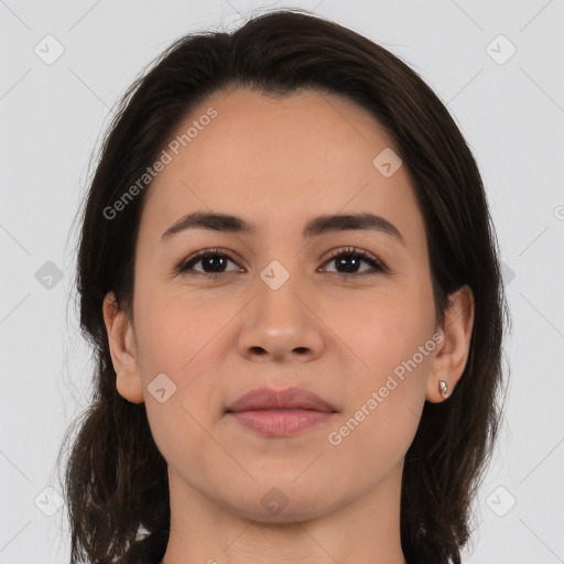 Joyful white young-adult female with long  brown hair and brown eyes