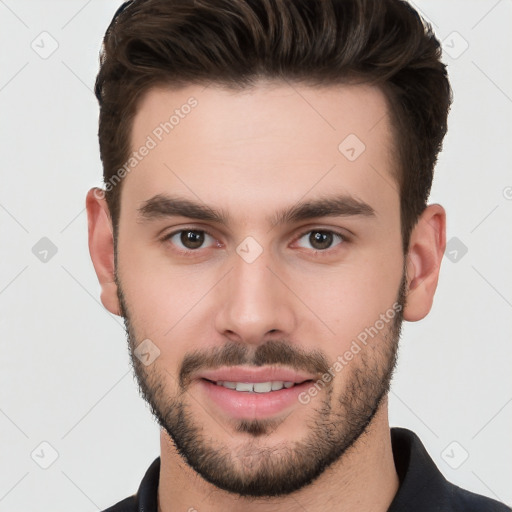 Joyful white young-adult male with short  brown hair and brown eyes