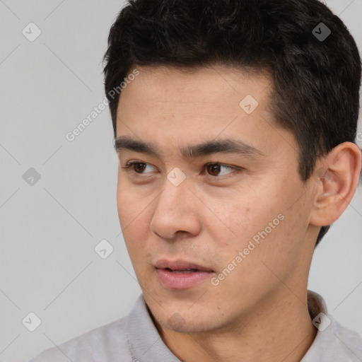 Neutral white young-adult male with short  black hair and brown eyes