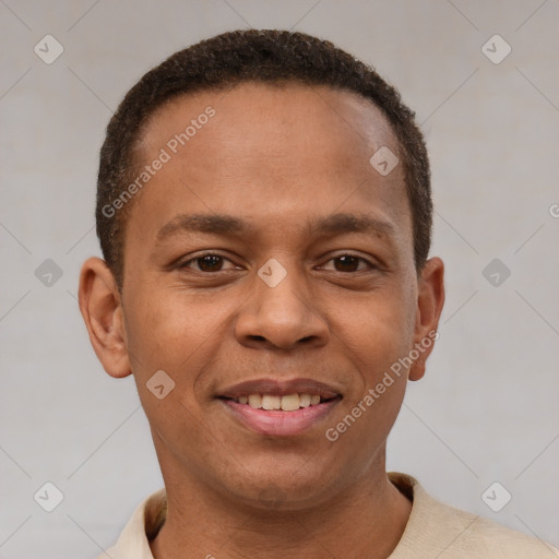 Joyful latino young-adult male with short  brown hair and brown eyes