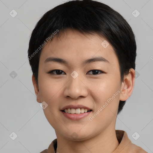 Joyful asian young-adult female with short  black hair and brown eyes