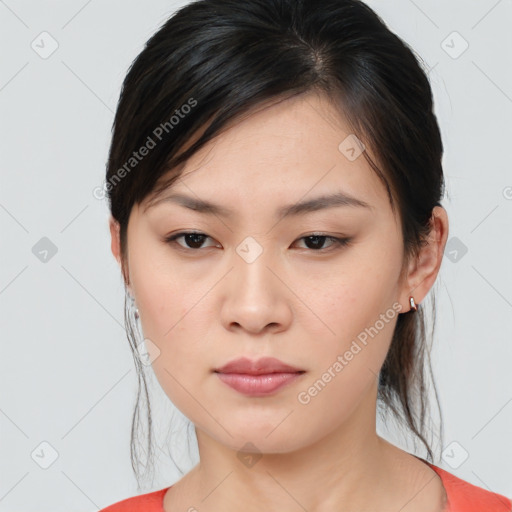 Neutral asian young-adult female with medium  brown hair and brown eyes