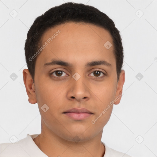 Neutral latino young-adult male with short  brown hair and brown eyes