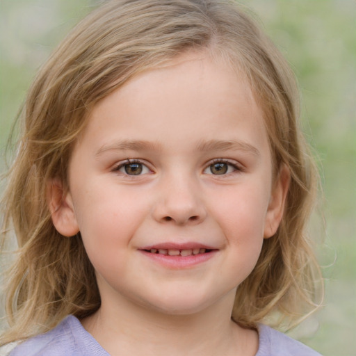 Joyful white child female with medium  brown hair and blue eyes