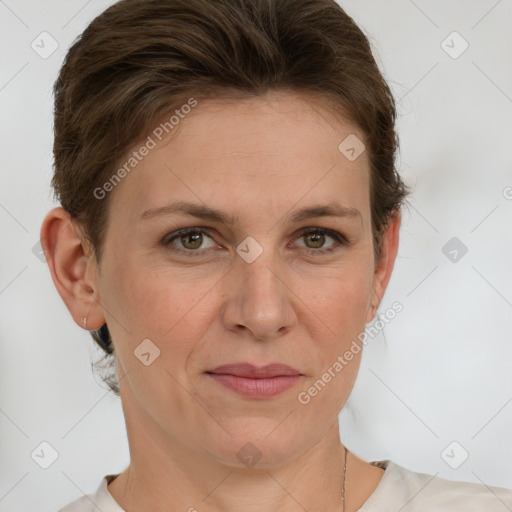 Joyful white adult female with short  brown hair and green eyes