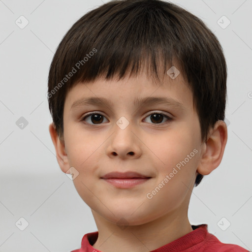 Joyful white child male with short  brown hair and brown eyes