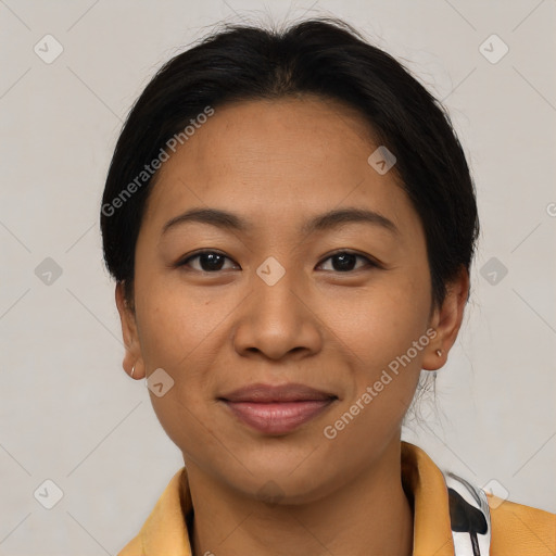 Joyful asian young-adult female with short  brown hair and brown eyes