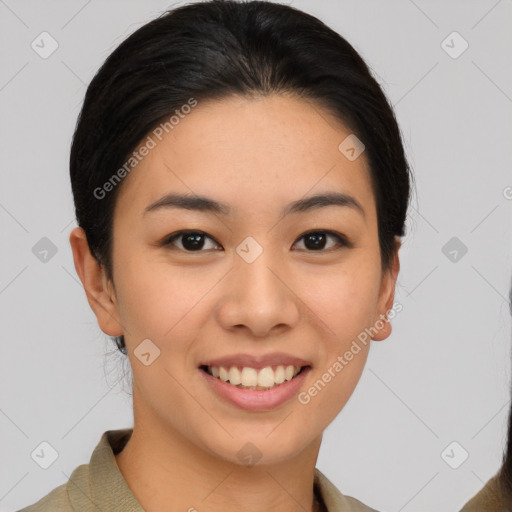 Joyful asian young-adult female with medium  brown hair and brown eyes