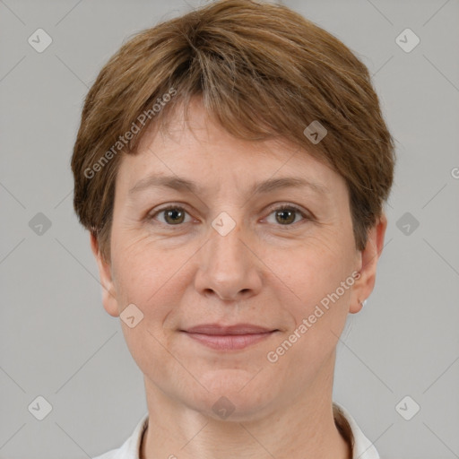 Joyful white adult female with short  brown hair and brown eyes