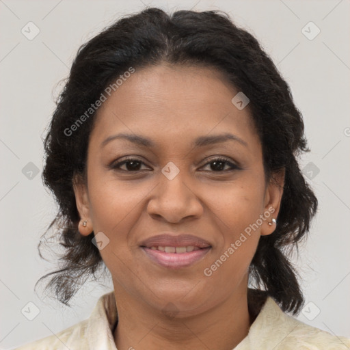 Joyful black adult female with medium  brown hair and brown eyes