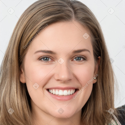 Joyful white young-adult female with long  brown hair and grey eyes