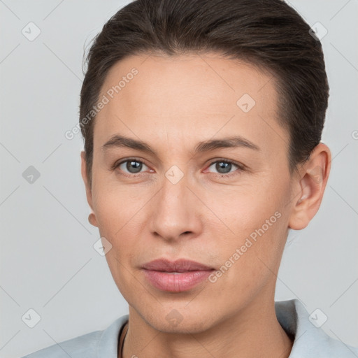 Neutral white young-adult female with short  brown hair and brown eyes