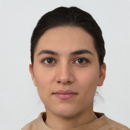 Neutral white young-adult female with short  brown hair and brown eyes