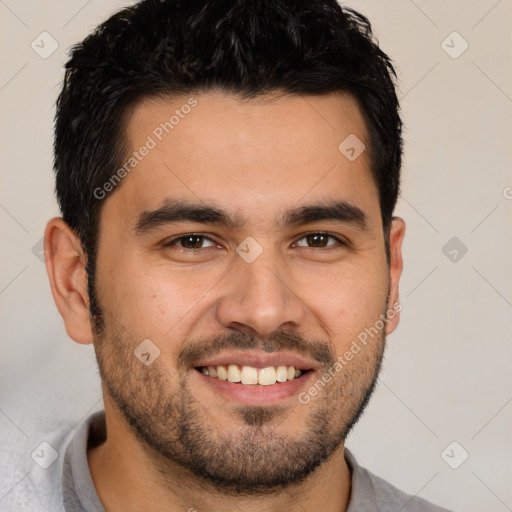 Joyful white young-adult male with short  black hair and brown eyes