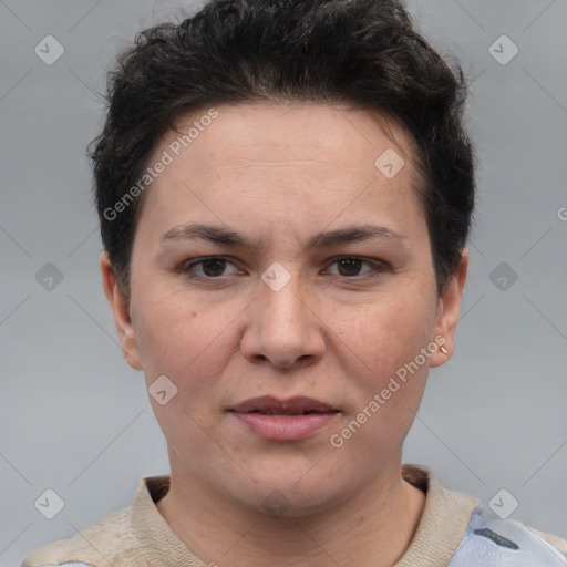 Joyful white adult female with short  brown hair and brown eyes