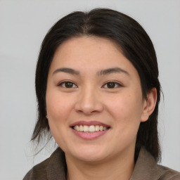 Joyful white young-adult female with medium  brown hair and brown eyes