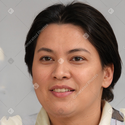 Joyful white adult female with medium  brown hair and brown eyes