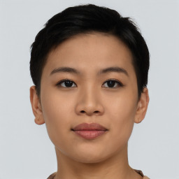 Joyful asian young-adult female with short  brown hair and brown eyes