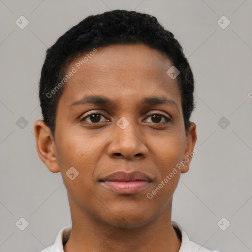 Joyful black young-adult female with short  black hair and brown eyes
