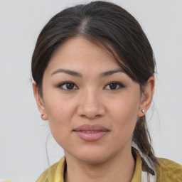 Joyful white young-adult female with medium  brown hair and brown eyes