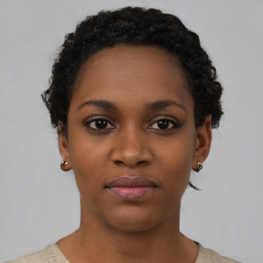 Neutral black young-adult female with short  black hair and brown eyes