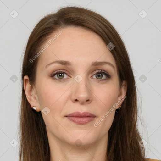 Joyful white adult female with long  brown hair and grey eyes