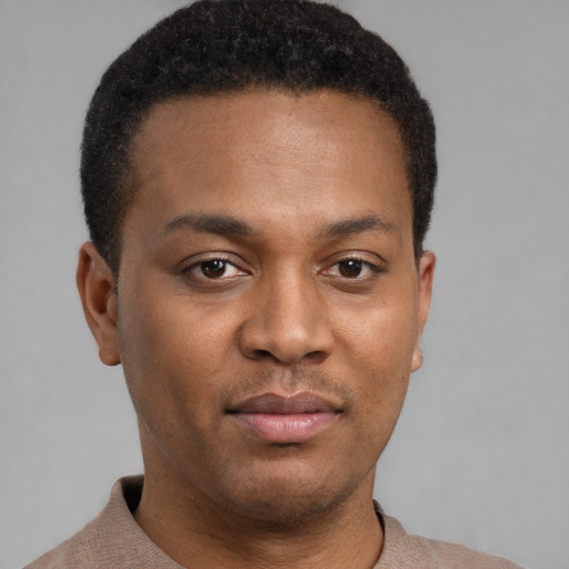 Neutral latino young-adult male with short  brown hair and brown eyes