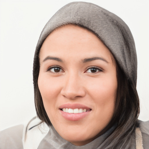 Joyful white young-adult female with medium  black hair and brown eyes