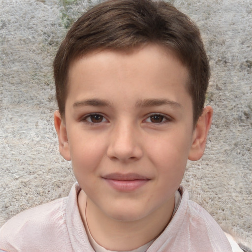 Joyful white child male with short  brown hair and brown eyes