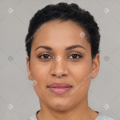 Joyful latino young-adult female with short  brown hair and brown eyes