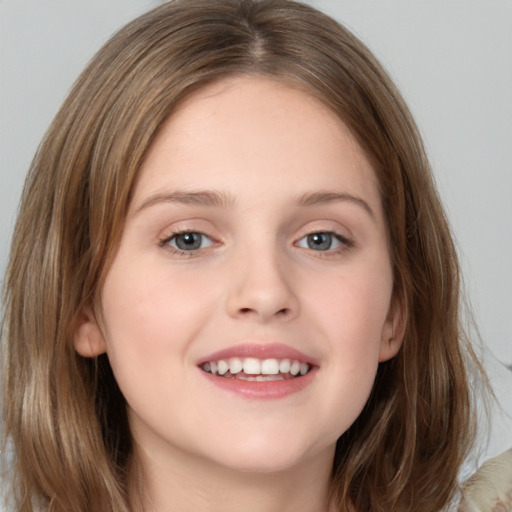 Joyful white child female with medium  brown hair and grey eyes