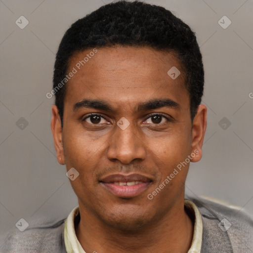 Joyful black young-adult male with short  black hair and brown eyes