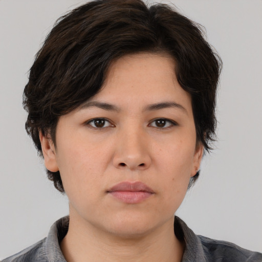 Neutral white young-adult female with medium  brown hair and brown eyes