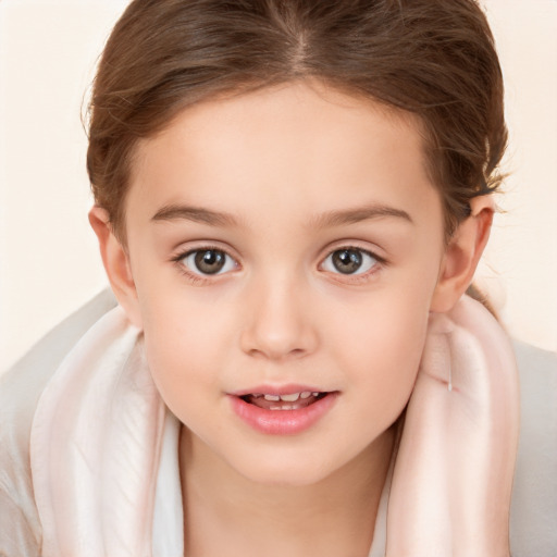 Joyful white child female with medium  brown hair and brown eyes