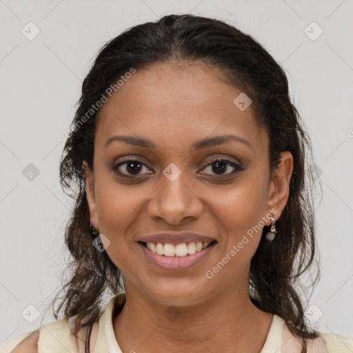 Joyful black young-adult female with medium  brown hair and brown eyes