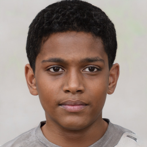Neutral black child male with short  black hair and brown eyes