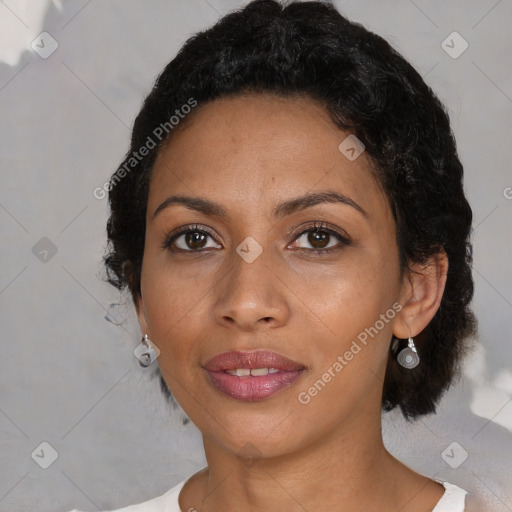 Joyful black young-adult female with medium  brown hair and brown eyes