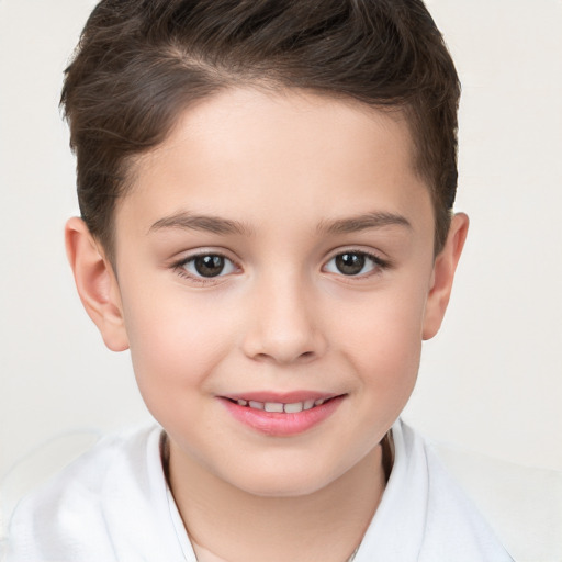 Joyful white child female with short  brown hair and brown eyes