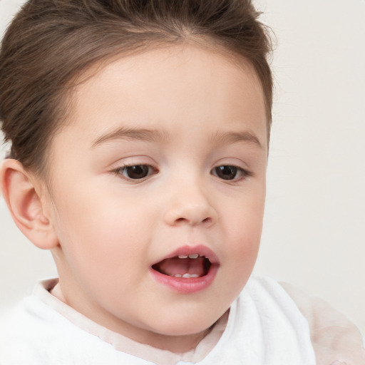 Joyful white child female with short  brown hair and brown eyes