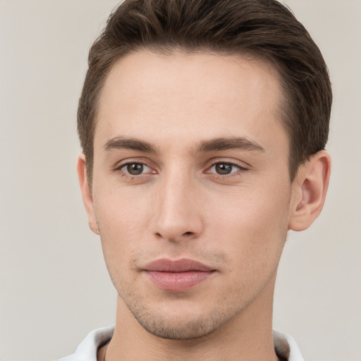 Neutral white young-adult male with short  brown hair and brown eyes