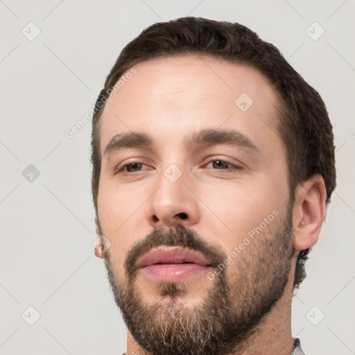 Neutral white young-adult male with short  brown hair and brown eyes