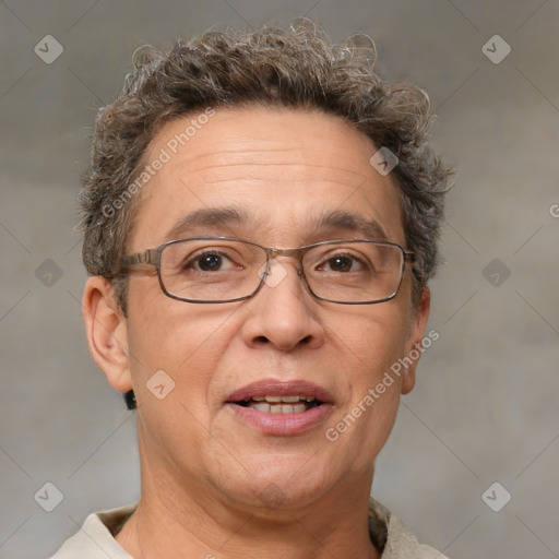 Joyful white middle-aged male with short  brown hair and brown eyes