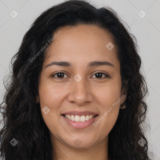 Joyful latino young-adult female with long  brown hair and brown eyes